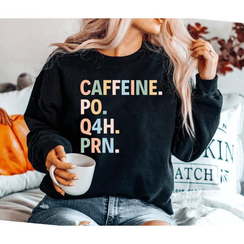 Caffeine PO Q4H PRN T-Shirt, Sweatshirt & Hoodie – Funny Nurse Coffee Quote Graphic